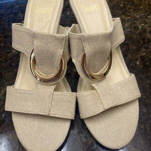 Beige wedges with gold detail. Size 8.5